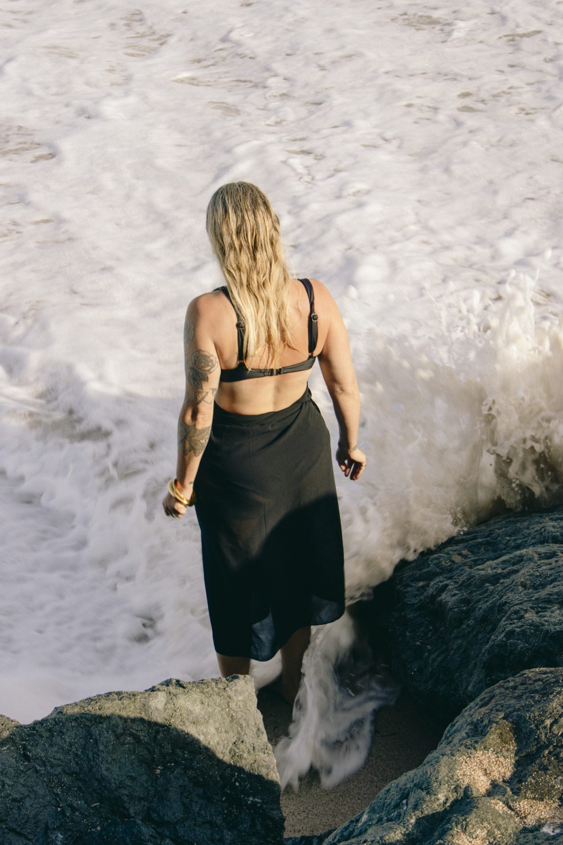Fashion and swimwear photography of a woman at the beach