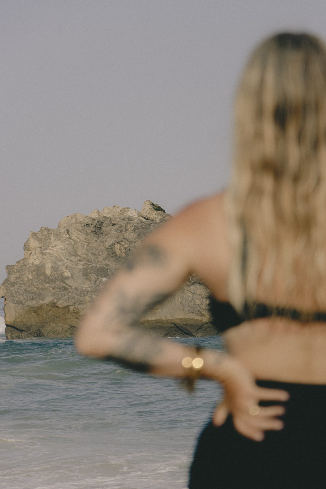 Fashion and swimwear photography of a woman at the beach