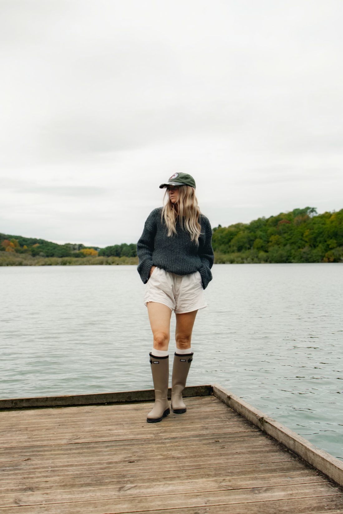 Fashion photography of a woman at a ponton lake in Biarritz