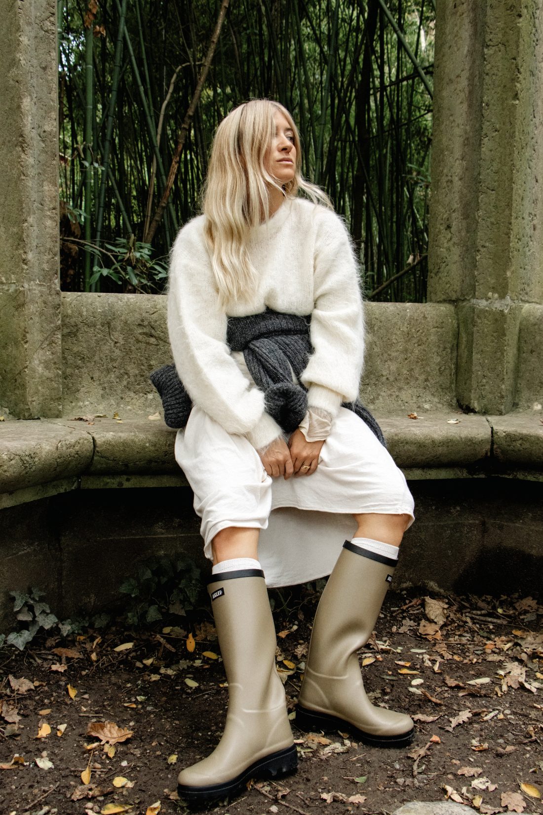 Fashion photography of a woman at a ponton lake in Biarritz