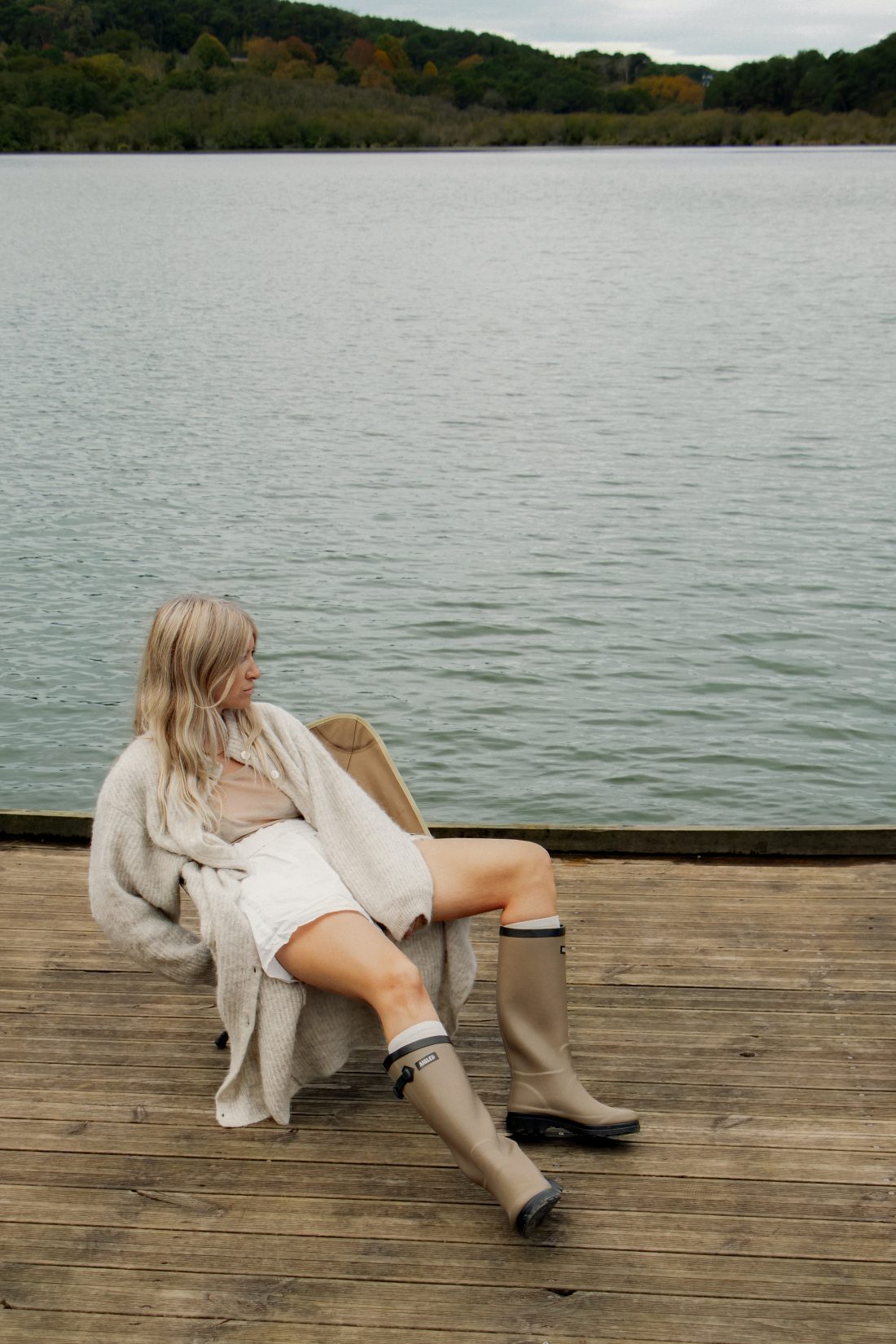 Fashion photography of a woman at a ponton lake in Biarritz