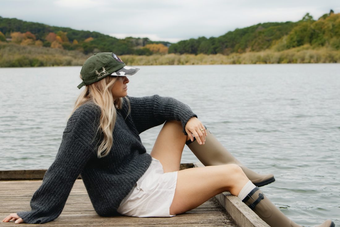 Fashion photography of a woman at a ponton lake in Biarritz