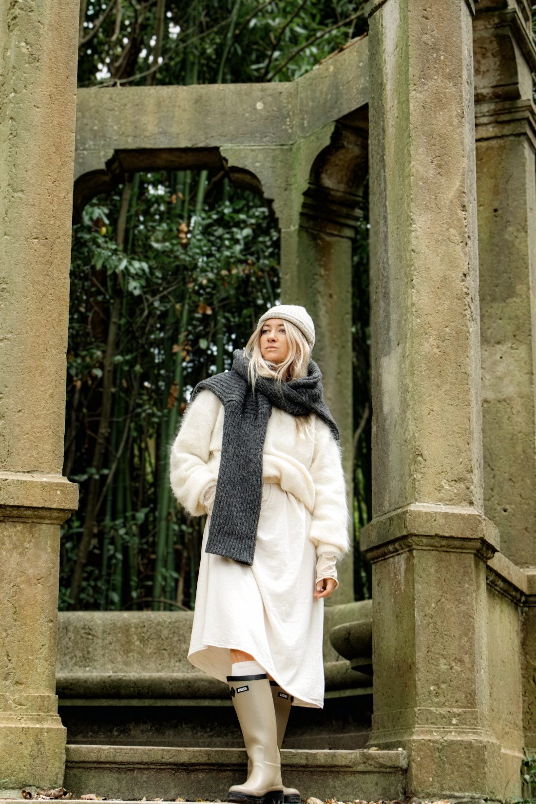 Fashion photography of a woman at a ponton lake in Biarritz