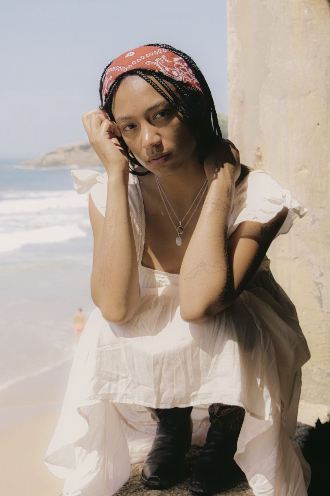 Fashion photography and editorial style — a woman wearing cowgirl clothes in Biarritz