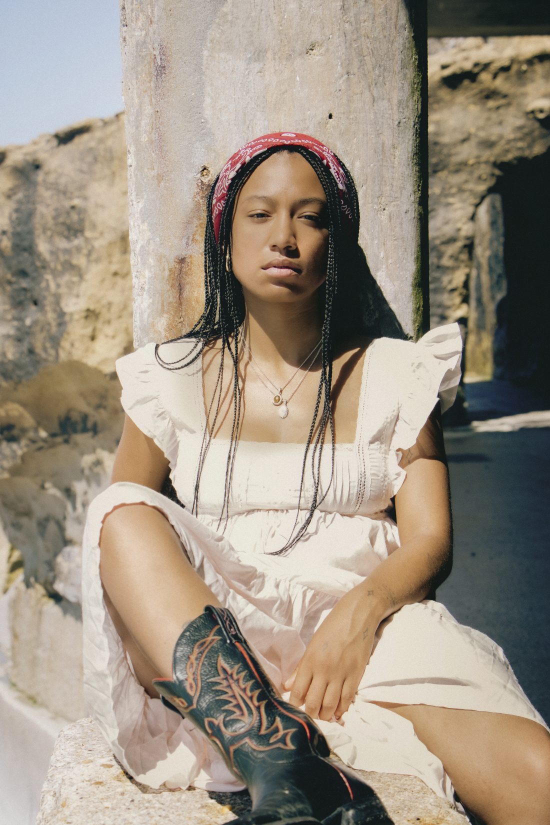 Fashion photography and editorial style — a woman wearing cowgirl clothes in Biarritz