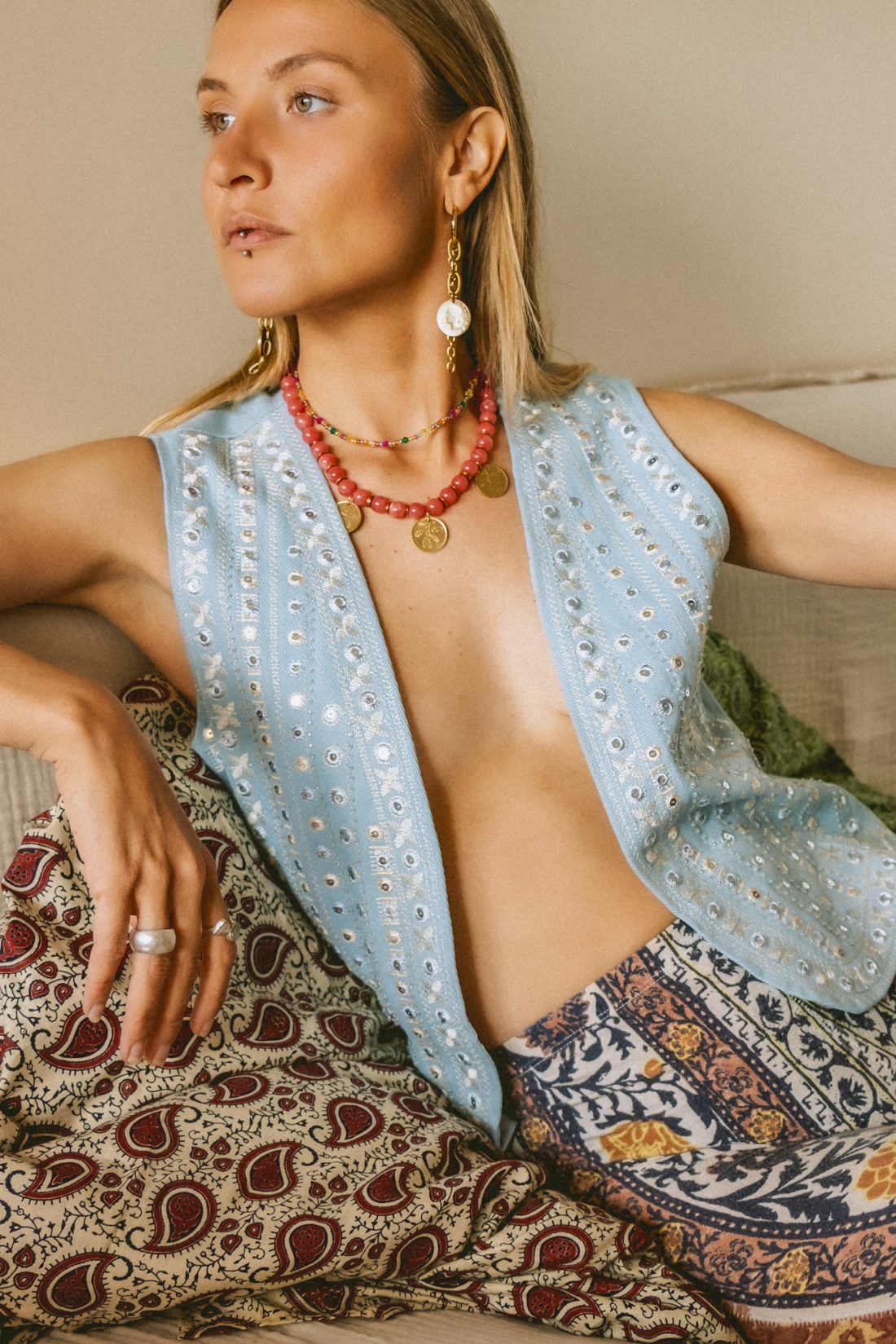 Product photography of a woman wearing Maison Prairie jewelry