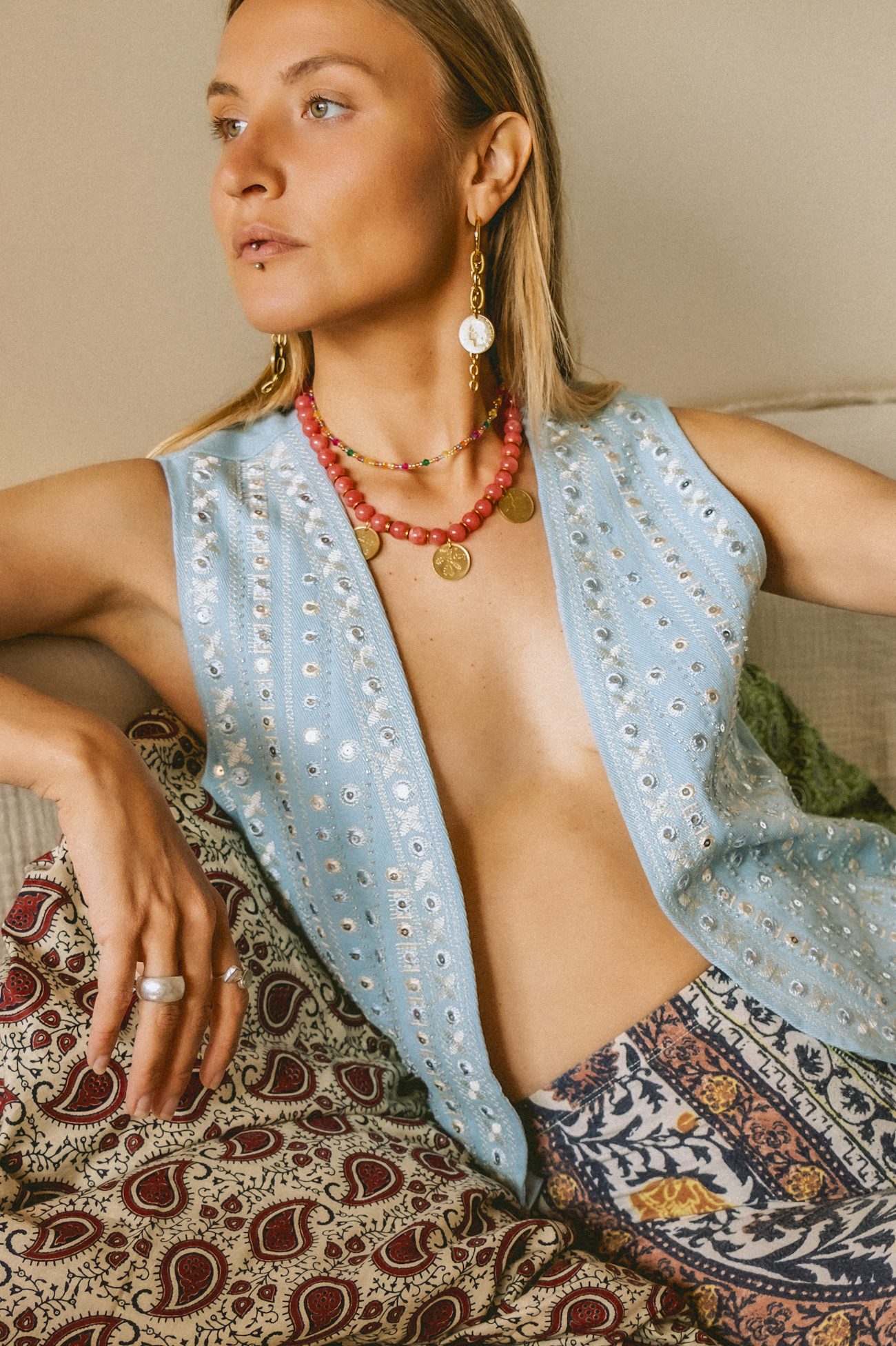 Product photography of a woman wearing Maison Prairie jewellery